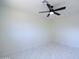 Neutral bedroom with white walls and floors, with a modern ceiling fan at 3547 W Encanto Blvd, Phoenix, AZ 85009