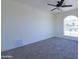 Neutral bedroom with carpet, ceiling fan, and bright natural light at 3547 W Encanto Blvd, Phoenix, AZ 85009