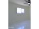 Bedroom showcasing marble-look tile flooring, bright natural light, and neutral color palette at 3547 W Encanto Blvd, Phoenix, AZ 85009