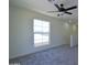 Upstairs room with carpet and bright natural light at 3547 W Encanto Blvd, Phoenix, AZ 85009