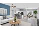 Bright open-concept living space boasts sleek modern finishes and abundant natural light at 36852 N Yellowstone Dr, San Tan Valley, AZ 85140