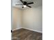 Bedroom featuring a ceiling fan, wood flooring, and neutral paint at 416 W Mission Ln, Phoenix, AZ 85021