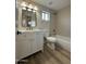 Bathroom featuring modern fixtures, tile backsplash and flooring, and vanity at 4216 E Tether Trl, Phoenix, AZ 85050