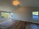 Bright bedroom featuring vaulted ceiling, neutral paint, and multiple windows at 4216 E Tether Trl, Phoenix, AZ 85050