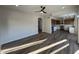 Open-concept living area flows into the remodeled kitchen, creating a modern and inviting space at 4216 E Tether Trl, Phoenix, AZ 85050