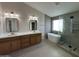 Luxury main bathroom features double vanity, soaking tub, and walk-in shower at 4216 E Tether Trl, Phoenix, AZ 85050