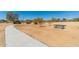 A scenic view of a park featuring walking path, picnic table, and open space at 4216 E Tether Trl, Phoenix, AZ 85050