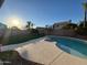 Backyard view features a pool, spa, and patio with lush landscaping at 4216 E Tether Trl, Phoenix, AZ 85050