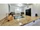 Granite counters accent the kitchen with modern appliances and ample countertop space at 4620 N 68Th St # 111, Scottsdale, AZ 85251