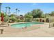 Community pool and lounge area at 4620 N 68Th St # 111, Scottsdale, AZ 85251