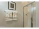 Modern bathroom featuring a glass enclosed shower, and neutral colored towels at 6451 N 17Th Pl, Phoenix, AZ 85016