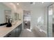 Bathroom featuring a double vanity, bathtub, and shower at 6451 N 17Th Pl, Phoenix, AZ 85016