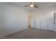 Bedroom with closet, neutral carpet and ceiling fan at 6451 N 17Th Pl, Phoenix, AZ 85016