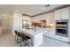 Stylish kitchen with white cabinets, quartz countertops, and stainless steel appliances at 6451 N 17Th Pl, Phoenix, AZ 85016