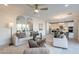 Open-concept living area seamlessly blends the living room, dining space, and modern kitchen at 6451 N 17Th Pl, Phoenix, AZ 85016