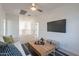 Upstairs living room with a flat screen TV and view of the landing at 6451 N 17Th Pl, Phoenix, AZ 85016