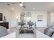 Inviting living room with a ceiling fan, modern furnishings, and stylish decor at 6451 N 17Th Pl, Phoenix, AZ 85016