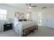 Spacious main bedroom with a ceiling fan, large windows and neutral decor at 6451 N 17Th Pl, Phoenix, AZ 85016