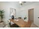 Home office features natural light, neutral color palette and a view of the hallway at 6451 N 17Th Pl, Phoenix, AZ 85016