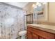 Bathroom featuring a sink, toilet, vanity with granite countertop, and a decorative shower curtain at 734 S Edgewater Dr, Mesa, AZ 85208