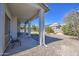 Covered patio overlooking backyard with desert landscaping and clear blue sky at 792 W Nolan Way, Chandler, AZ 85248