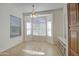 Sunny breakfast nook with tile flooring, bright windows, and a ceiling fan at 792 W Nolan Way, Chandler, AZ 85248