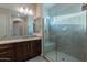 Bathroom with granite countertop, vanity, and glass shower stall at 8180 W Silver Spring Way, Florence, AZ 85132