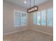 Bright dining space with plantation shutters at 8180 W Silver Spring Way, Florence, AZ 85132