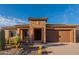 Charming single-story home with a stone facade and a well-manicured desert landscape at 8180 W Silver Spring Way, Florence, AZ 85132