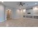 Bright living room with neutral walls and tiled flooring at 8180 W Silver Spring Way, Florence, AZ 85132