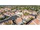 An aerial view of homes, landscaping, and streets in a suburban neighborhood at 819 W Kyle E Ct, Gilbert, AZ 85233