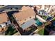 Aerial view of the back of a house with a pool and covered patio at 819 W Kyle E Ct, Gilbert, AZ 85233