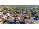 An aerial view showcasing pools, mature trees, and well-maintained homes in a residential neighborhood at 819 W Kyle E Ct, Gilbert, AZ 85233