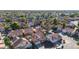 Aerial view of a community with pools, landscaping, and varied architectural styles at 819 W Kyle E Ct, Gilbert, AZ 85233