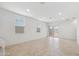 Bright and airy living room with large windows and tile flooring is ideal for entertaining or relaxing at home at 8452 W Clemente Way, Florence, AZ 85132