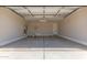 Spacious two-car garage with high ceilings and ample room for vehicles and storage solutions at 8553 N 175Th Ln, Waddell, AZ 85355
