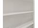 Walk-in pantry with white shelving offering storage solutions and organization at 8553 N 175Th Ln, Waddell, AZ 85355