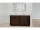 Stylish bathroom featuring a double vanity with sleek countertops and modern fixtures, offering ample counter space at 8554 W Trenton Ct, Florence, AZ 85132