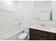 Clean and bright bathroom featuring a shower-tub combination and a vanity with modern fixtures at 8554 W Trenton Ct, Florence, AZ 85132