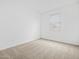 Bright and airy bedroom featuring neutral carpet, white walls and a large window at 8554 W Trenton Ct, Florence, AZ 85132