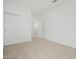 Spacious bedroom featuring neutral carpet, double closet, and bright white walls at 8554 W Trenton Ct, Florence, AZ 85132