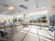 Bright fitness center with mirrored walls, modern equipment, and scenic outdoor views at 8554 W Trenton Ct, Florence, AZ 85132