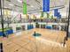 Large gymnasium with basketball courts and volleyball nets, providing a versatile space for activities at 8554 W Trenton Ct, Florence, AZ 85132