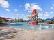 Inviting community pool area with playful water fountains and shade, designed for relaxation and Gathering enjoyment at 8554 W Trenton Ct, Florence, AZ 85132