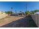 Large, private backyard with mature trees and block fence at 8626 N 50Th Ln, Glendale, AZ 85302