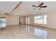 Spacious living room featuring tile floors, recessed lights and a large window at 8626 N 50Th Ln, Glendale, AZ 85302