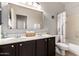 Elegant bathroom with a double sink vanity, modern fixtures, and a shower-tub combination at 9360 E Milagro Ave, Mesa, AZ 85209