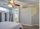 Bedroom featuring neutral walls, carpet flooring, and access to the bathroom at 9404 W Pierson St, Phoenix, AZ 85037