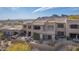 An exterior of the back of the home, showcasing the patio and BBQ at 9715 N Azure Ct # 4, Fountain Hills, AZ 85268