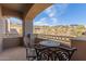 A cozy balcony seating area overlooks the stunning hillside neighborhood at 9715 N Azure Ct # 4, Fountain Hills, AZ 85268